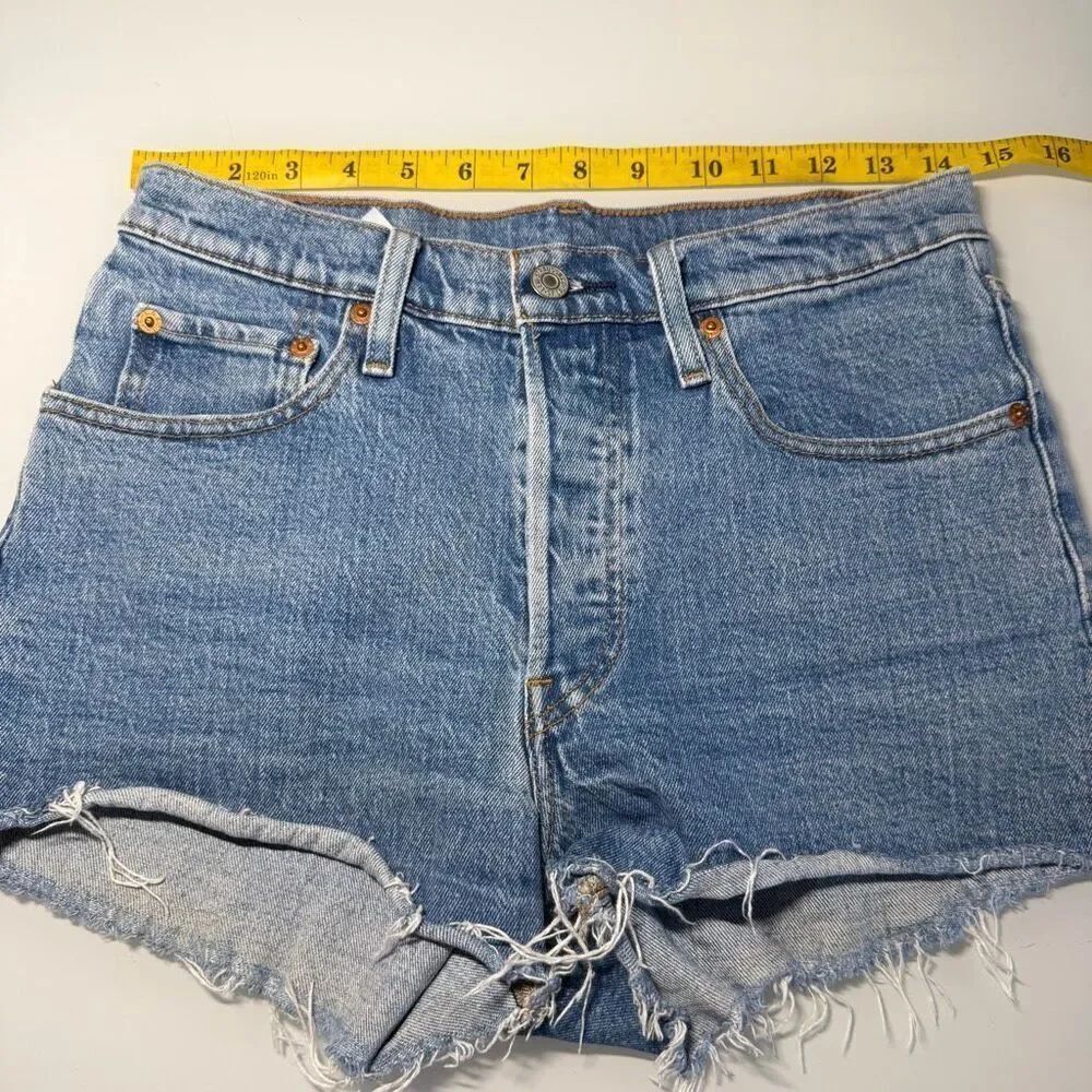 Levi’s Blue Denim Distressed Raw Hem High Rise Button Fly Cut Off Shorts Size 27